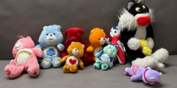 A selection of cuddly toys to include Care Bears