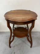 A satinwood occasional table with ornate legs and a scalloped edge H70cm W57cm D55cm Condition