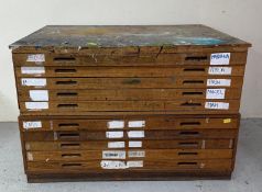 A light oak ten-drawer plan chest (H87cm W127cm D95cm) Condition Report multiple paint marks,