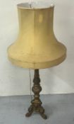 A Rococo style floor standing lamp with shade