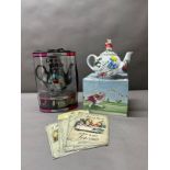 Alice in Wonderland, two novelty teapots and four metal wall signs