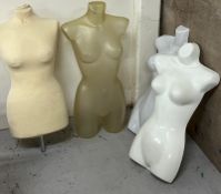 Four mannequin torsos