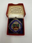 A silver and enamel Windsor Slough & District League medal, awarded in 1936/7 Division Five