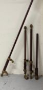 Four mahogany curtain poles with empire style ends 155,182,177,352cm x dia 5.5cm Condition Report