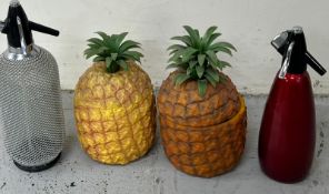 Two vintage pineapple ice buckets and two soda syphons