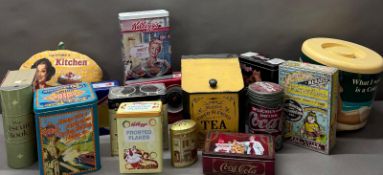 A large quantity of collectible tins to include Kellogg's and Coca-Cola
