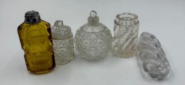 A selection of as found vintage perfume bottles in various styles