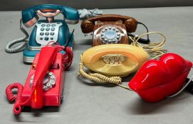 A collection of retro-style landline phones which are modern replicas of classic phones