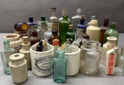 A selection of vintage bottles and jars.