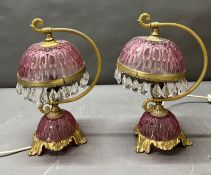 A pair of glass pink lamps H35cm