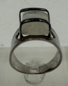 An abstract opal ring mounted in silver circa 1970, approximate weight 6.9g and size O
