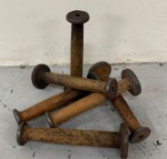 A six vintage industrial bobbins