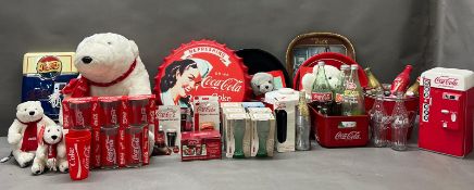 A large collection of Coca Cola memorabilia from various years to include a Pepsi Cola telephone,