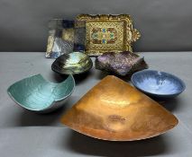 A selection of dishes and bowls in various styles.