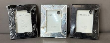 Three picture frames, two black and one mirrored 17cm x 12cm Condition Report frame good,