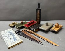 A selection of desk items to include six blotters craven a cigarette tin and six various letter