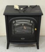 A Dimplex electric heater in the form of a wood burning stove H60cm W51cm D32cm Condition Report