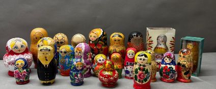 A large collection of wooden Russian nesting dolls Condition Report good condition