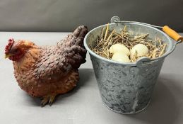 Faux hen with eggs