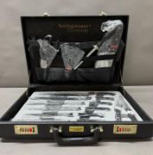 A Solingmeyer of Germany carving knife set in a briefcase.