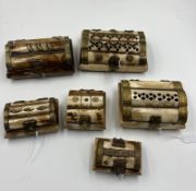 Six Indian bone and brass trinket boxes