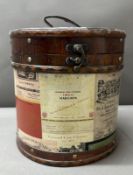 A circular decorative wine box with a handle to top (H25cm Dia25cm)