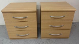 A pair of contemporary three drawers bedside tables (H55cm W48cm D42cm) Condition Report good