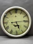 A circular wall hanging kitchen clock in white Dia60cm
