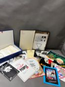 A selection of theatre programmes, press cuttings and sheet music.