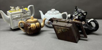 A selection of novelty teapots