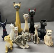 A collection of mid-century long-neck china cats and others