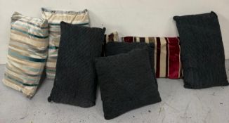 A selection of cushions various tyles and sizes