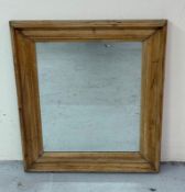 A pine framed hall mirror 57cm x 67cm