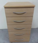 A contemporary five-drawer chest of drawers (H88cm W48cm D43cm) Condition Report good condition