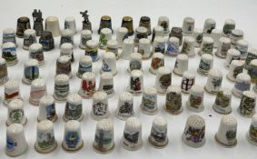 A large collection of thimbles china and metal, various themes Condition Report used, some with