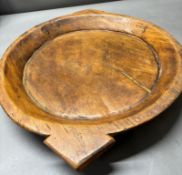 A Vintage Indian rustic turned wood 'Parat Bowl' 58cm largest diameter.