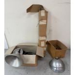 A selection of industrial style light fittings and tripods.
