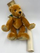A small Merrythought Millennium Teddy bear with certificate