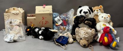 A selection of boxed and bagged Steiff cuddly toys