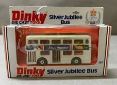 A boxed Dinky toy, silver jubilee bus