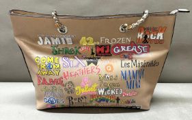 A hand painted musical themed handbag by local artist Julia Adams Instagram: theartymart