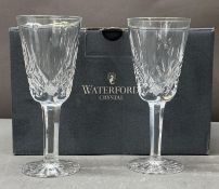A boxed Waterford crystal sherry glasses