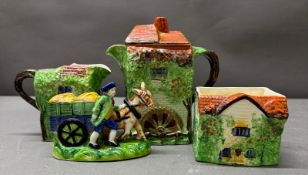 A Ye Olde Cottage jug together with a horse and cart salt and pepper