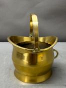 A vintage brass miniature coal scuttle