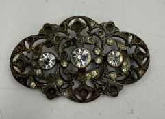 A vintage Art Deco style brooch