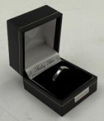 A silver fashion ring marked 925