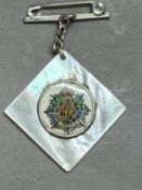 A Royal Army Service Corp mother of pearl sweetheart brooch.