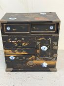 Gilt and black lacquered kodansu style table cabinet, inlaid with blue and white china