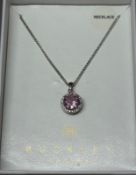 A pink necklace by Buckley of London