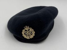 A blue RAF cap with a central badge